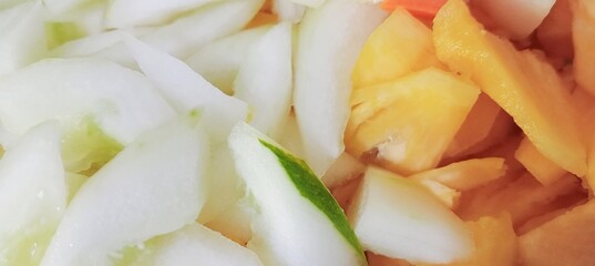 Close-up of sliced of tropical fruits