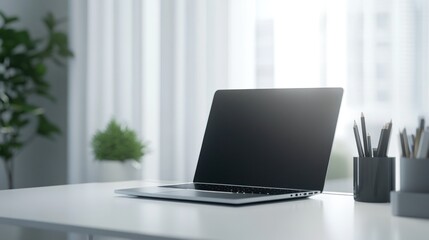 Laptop on a Desk by a Window