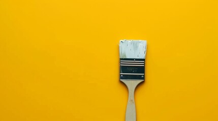 Paint Brush on Yellow Background