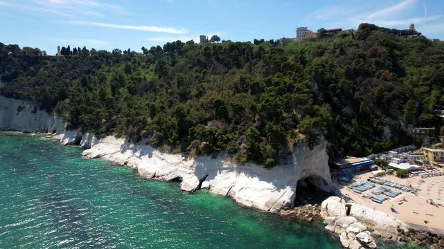 Italy summer holidays, best scenic sea landscape and beaches of Riviera del Conero- natural park near Ancona. Marche. View of picturesque beach Spiaggia del Frate. 4k hd aerial drone video