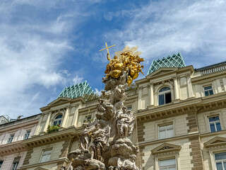 Naklejka premium Vienna, Austria - July 23, 2024: The column of Pest statue in Vienna 