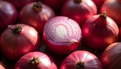Red onions with sliced onion in the center, showing the layered structure and bright pink color