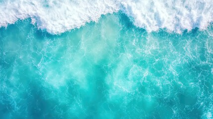 Fototapeta premium A captivating image showcasing vibrant sea wave motions in an expansive turquoise ocean, perfect for invoking a sense of adventure and nature's beauty.