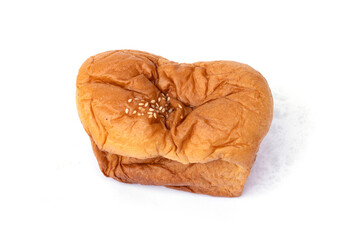 Fluffy square baked bread with filling inside and sprinkled with white sesame seeds on the top isolated on white background.