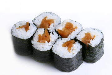 Oshinko Maki. Pickled radish rolled with sushi rice wrapped by dried seaweed on white background 