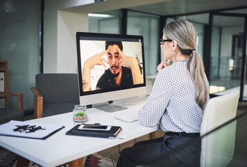 Fototapeta premium Psychologist, man and patient with computer for online therapy with mental health support, listening and trauma treatment. Doctor, person and video call for counseling, depression and healing advice