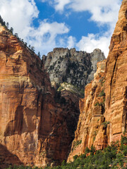 The Great White Throne, one of iconic mountain peaks in Zion National, Utah, USA, peaking out...