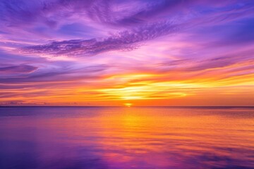 Fototapeta premium Fantasy vibrant panoramic sunset sky with purple, orange, and yellow hues over the sea, creating an ethereal and uplifting scene