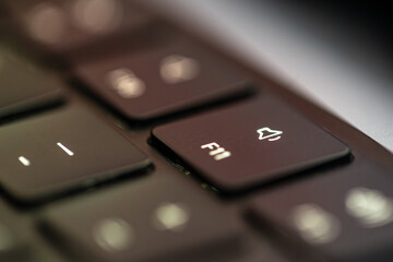Fototapeta premium Sound button close-up. Laptop keyboard.