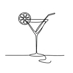 A glass of martini with a slice of lemon on top. The glass is half full and the lemon slice is on the rim of the glass