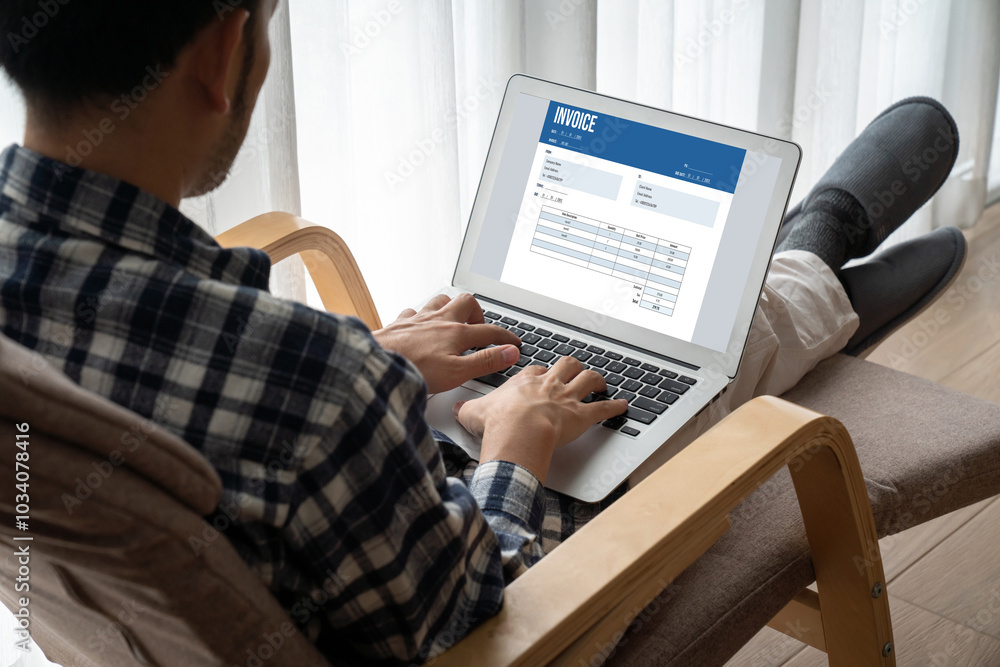 Poster invoice on computer screen from accounting application. computer program for financial and budget of