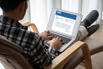 Invoice on computer screen from accounting application. Computer program for financial and budget of corporate business. Snugly.