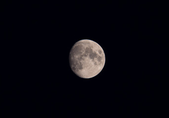 The Moon Against A Dark Black Sky At Night. Captured with telephoto lens in Skane County, Sweden. 