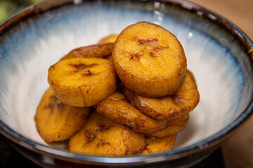 A bowl of Fried Plantain ready to be placed in a dish