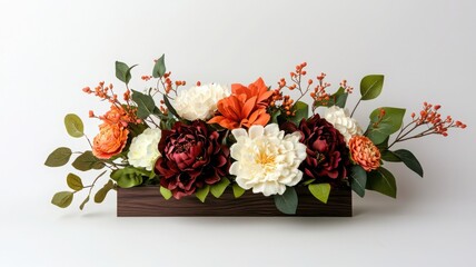 Colorful floral arrangement with roses and greenery on white background.