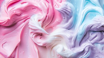 Obraz premium Colorful swirls of soft cream create an artistic pattern in pastel shades of pink, purple, and blue