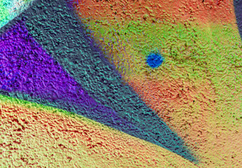 Beautiful colorful street art graffiti background for wallpaper and design.. Abstract bright painting pattern of urban art on a grunge wall.