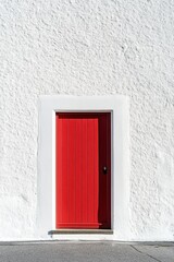 Red Door on White Building Facade