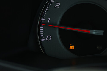 Empty fuel warning light in car dashboard. Fuel pump icon. gasoline gauge dash board in car with...