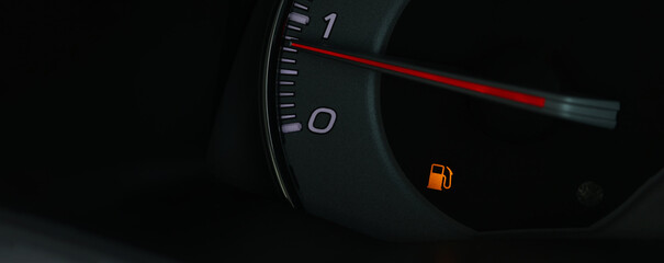 Empty fuel warning light in car dashboard. Fuel pump icon. gasoline gauge dash board in car with digital warning sign of run out of fuel turn on. Low level of fuel show on speedometer dashboard.