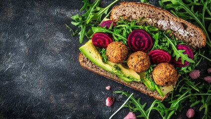 Delicious Falafel Sandwich with Avocado, Beetroot, and Arugula