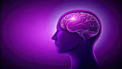 Obraz premium A silhouette of a human head with a bright glowing brain, representing intelligence and cognitive function.