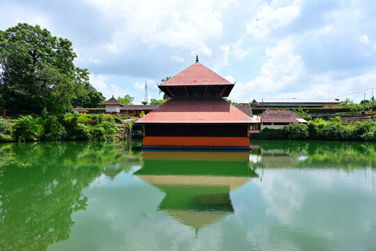 Pink hued middle roof of lake temple