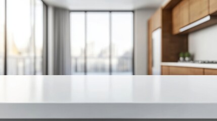 Clean, empty white countertop with blurred kitchen background, ideal for showcasing products or creating a minimalist kitchen mockup