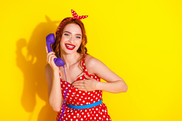 Photo of adorable cute lady wear red stylish dress speak phone news gossip secret isolated on yellow color background