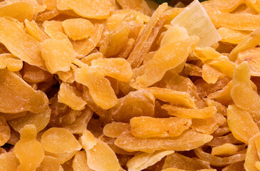 background of many small pieces of Dehydrated ginger for sale in the stall of the market