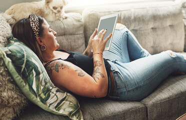 House, relax and woman on sofa, tablet and internet with social media, typing and connection....