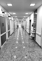 A completely empty hospital corridor with no doctors or patients.