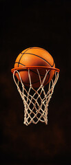 Fototapeta premium Dynamic action of a basketball suspended in mid-air perfectly nestled in a hoop against a dark background capturing the essence of sports and athleticism