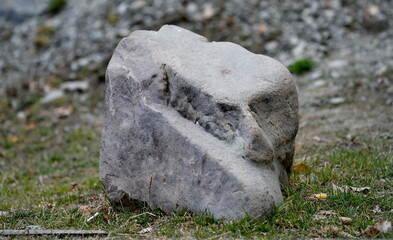 Russia, Dagestan. An unusual stone with a natural image of a dog's face at the top of a canyon on...