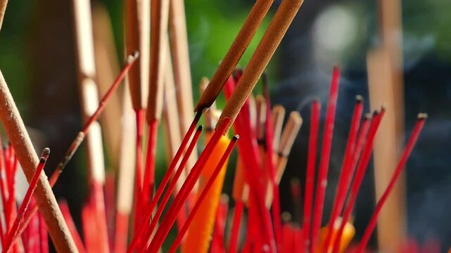 Incense and smoke burning in a pot.