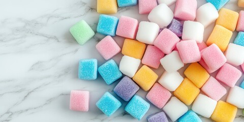 Colorful Sugar Cubes on Marble Background
