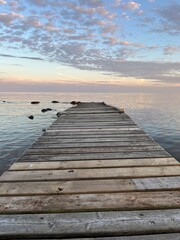 Obraz premium wooden pier at sunset