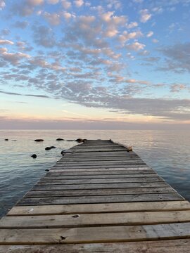 Fototapeta wooden pier at sunset