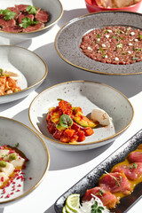 Asian-Style Avocado with Salmon Vibrant Dish on Minimalist Plates in Bright Lighting