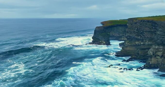 Turquoise ocean water crashes against the cliffs of moher under a cloudy sky, creating a stunning coastal scene
