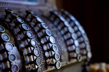 close up of an antique brass cash register
