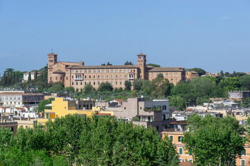 The Anselmianum, also known as the Pontifical Athenaeum of Saint Anselm on the Aventine Hill seen from Monte Testaccio, Rome, Italy