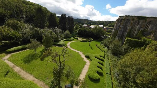 Flying around the ruins of Aulne abbey monastary between thuin and landelies, Belgium. Medieval building and monument.
