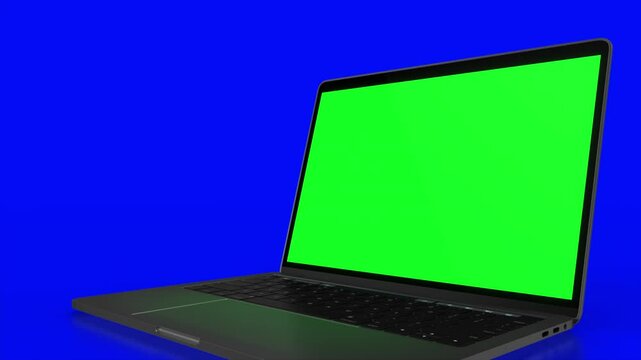 4K Video. Laptop (Notebook) Turning On With green Screen On A blue Background.