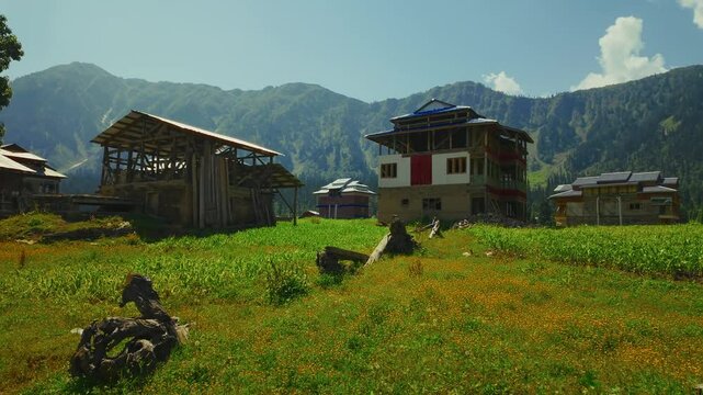 Traditional houses in Arang Kel village in Neelum valley on a sunny day in Azad Kashmir, Pakistan