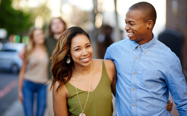 City, hug and happy couple with walking for travel, vacation journey and bonding together for...
