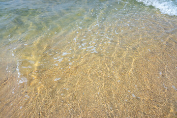 transparent seawater on the shore of a beach, relax in summer concept background