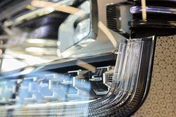 Close up of a cars headlight, part of automotive design
