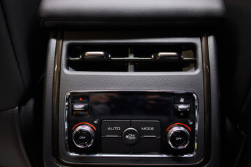 A close up of a car s rear air conditioning system