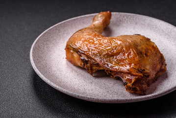 Delicious grilled chicken leg or quarter with salt and spices